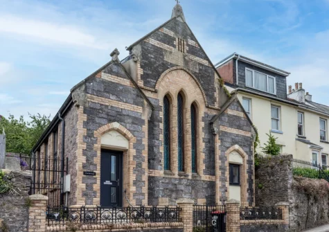 The Old Chapel is a beautifully converted 1880s chapel with four bedrooms and a hot tub