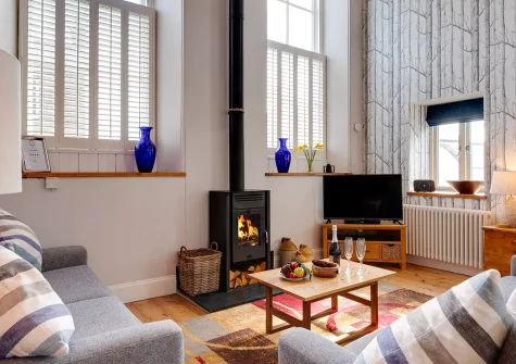 The Old Chapel, Newbridge is a characterful converted Methodist chapel nestled in stunning Cornish countryside, offering unique group accommodation with mezzanine views, period charm, and convenient access to beaches and attractions.