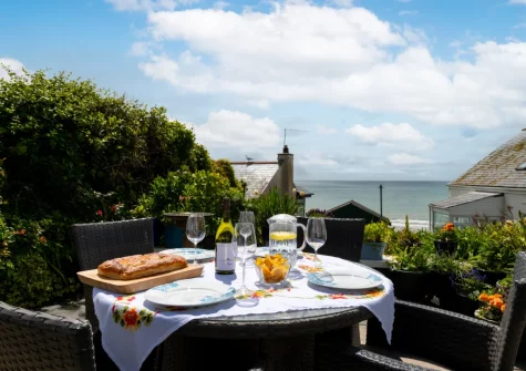 The patio & alfresco dining area at The Old Cowshed, Marazion