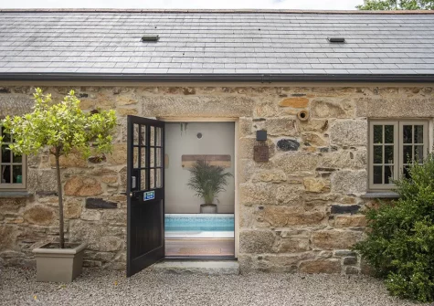The shared indoor heated swimming pool at Penbroath Retreats