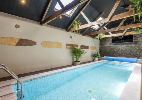 The shared indoor heated swimming pool at Penbroath Retreats