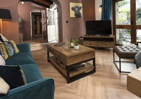 The Old Dairy, Carnhell Green is a luxurious barn conversion featuring a bubbling hot tub, shared heated pool, and magical children's den with mezzanine sleeping. Perfect for families seeking rustic charm with modern comforts in rural Cornwall.