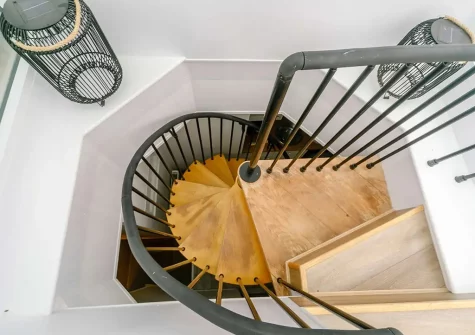 The spiral staircase up to the conservatory & rooftop terrace at The Old Dairy, Fowey