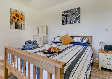 The bedroom at The Old Duck House, Porthcothan
