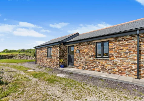 The Old Duck House is a beautifully converted barn with stunning views over Porthcothan Bay & surrounding countryside