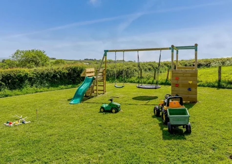 The children's play area at The Old Granary, Rookabear, Combrew