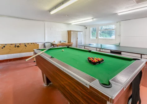 The shared games room at The Old Mill Cottage, Advent