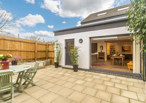 Bi-fold doors open onto the pretty patio, perfect for alfresco dining at The Old Post Office At Treverva