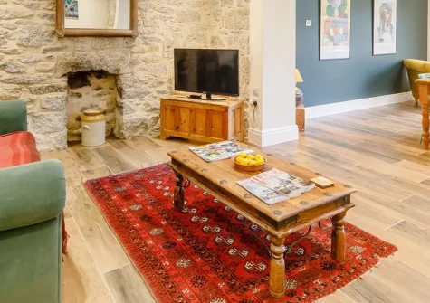 The Old Post Office, Treverva is a charming Cornish cottage blending character with modern luxury. Enjoy bifold doors opening to a private garden, explore nearby towns, or enjoy country walks from your doorstep. It's perfect for family holidays.