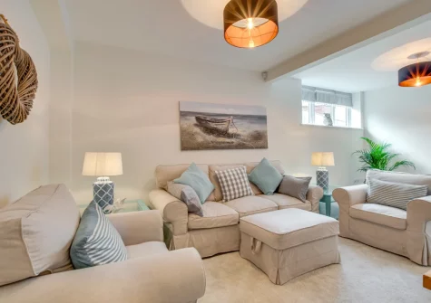 The living area at The Old Sail Loft, Beer