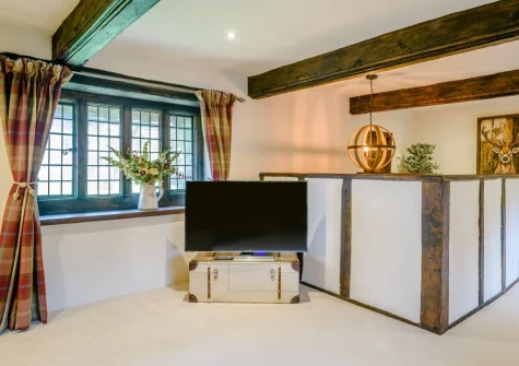 The living room at The Old Stables at Stafford Barton, Dolton