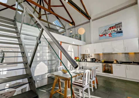 Step down from the living area into the kitchen & dining area at The Old Sunday School, Rumford