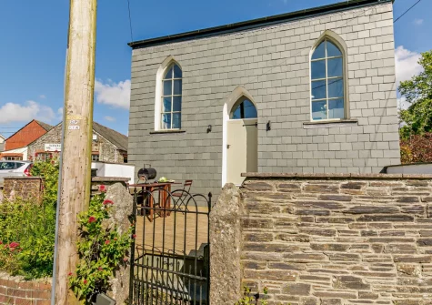 The Old Sunday School is a unique Grade II-listed building, with incredible features such as exposed beams & high-arched windows