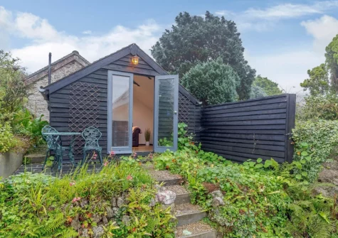 The mature tiered garden & summerhouse at The Old Sunday School, St Just