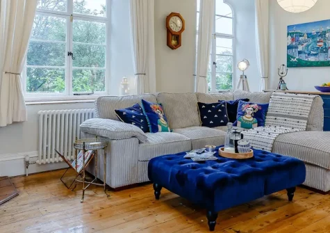 The Old Sunday School, St Just is a charming 2-bedroom historic retreat blending elegant period features with modern comforts. Enjoy a cosy wood burner, beautiful garden terraces, and easy access to Cornwall's stunning coast and attractions.