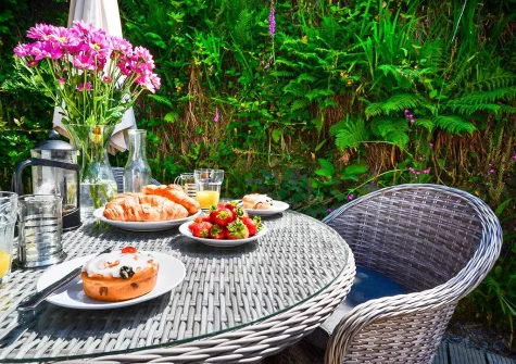 The patio & alfresco dining area at The Orangerie, Gilbert's Coombe