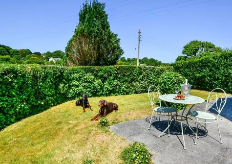 The patio, outdoor sitting area & garden at The Orangerie, Gilbert's Coombe