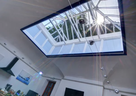 The high apex ceiling & large Victorian skylight at The Orangery, Lynton Cottage, Lynton