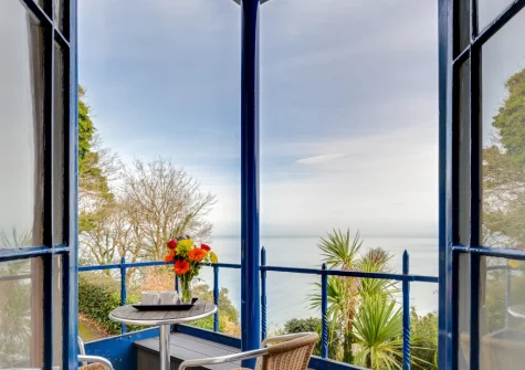 Bedroom #1 balcony & outdoor sitting area at The Orangery, Lynton Cottage, Lynton
