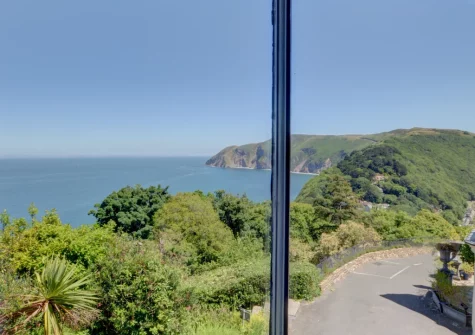 The coast & sea view from bedroom #2 at The Orangery, Lynton Cottage, Lynton