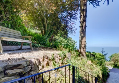 The private pebbled patio & outdoor sitting area at The Orangery, Lynton Cottage, Lynton