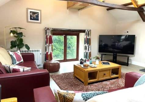 The living room at The Owl Barn at Lower Langaton Farm, Chittlehampton
