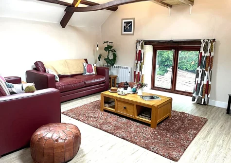 The living room at The Owl Barn at Lower Langaton Farm, Chittlehampton