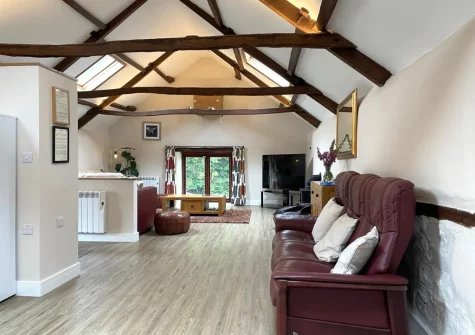 The living room at The Owl Barn at Lower Langaton Farm, Chittlehampton