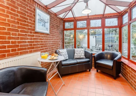 The conservatory sitting area at The Pebbles, Bideford