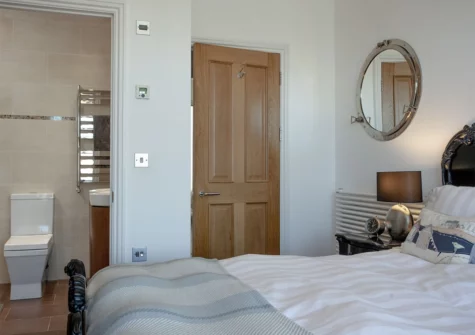 Bedroom #1 & en-suite at The Penthouse, 15 At The Beach, Torcross
