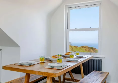 The dining area at The Penthouse Larkrise, Mortehoe