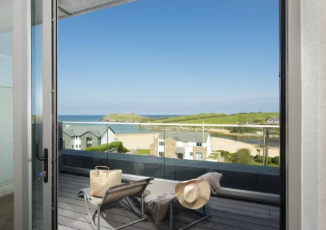 Bedroom #1 has access to the wrap-around balcony at The Penthouse, Oasis Sands, Newquay