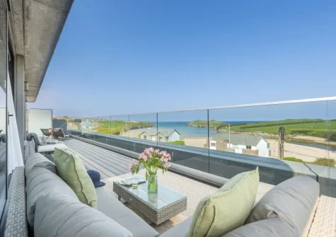 The wrap-around balcony & outdoor sitting area at The Penthouse, Oasis Sands, Newquay