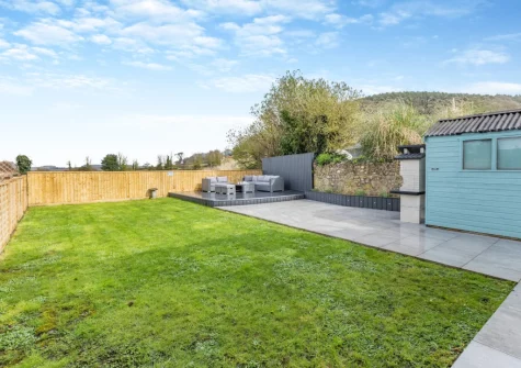The decked patio, barbecue, outdoor sitting area & enclosed garden at The Pidgeon Nest, Axmouth