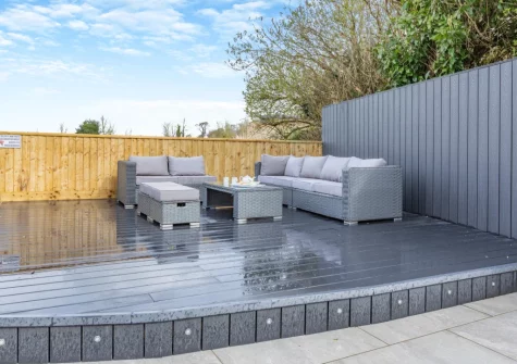 The decked patio & outdoor sitting area at The Pidgeon Nest, Axmouth