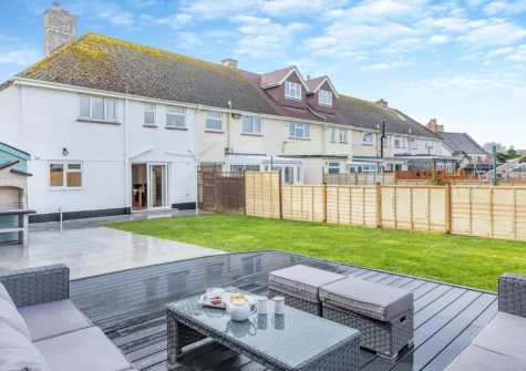 The decked patio, barbecue, outdoor sitting area & enclosed garden at The Pidgeon Nest, Axmouth