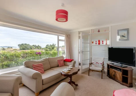 The living room at The Pink Beach Bungalow, Paignton