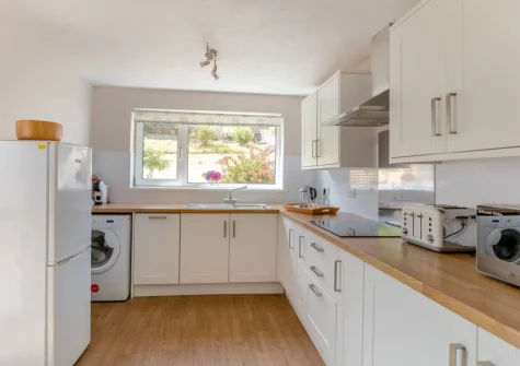 The kitchen at The Pink Beach Bungalow, Paignton