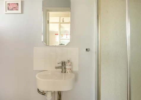Bedroom #1 en-suite shower room at The Pink Beach Bungalow, Paignton
