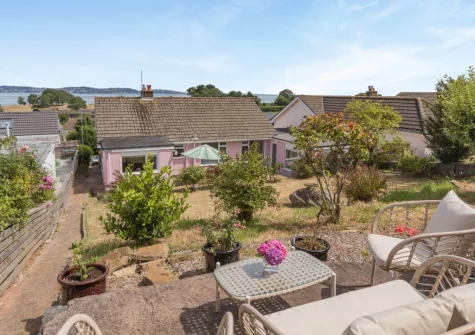 The tiered garden & outdoor sitting area at The Pink Beach Bungalow, Paignton