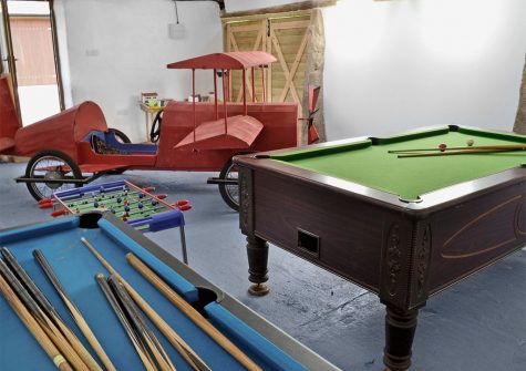 The shared games room at The Place 2 B, Higher Churchtown Farm, Tresmeer