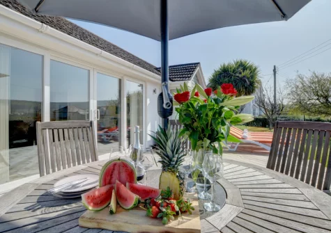 The decked patio & alfresco dining area at The Reeds, Croyde