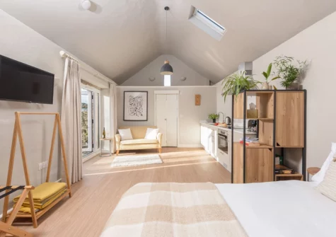 The open-plan sleeping area at The Rest House, Polgigga