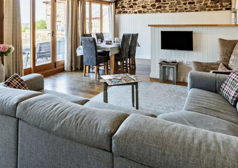 The Root House, North Nethercleave Farm, Umberleigh is a charming 3-bedroom barn conversion nestled in peaceful farm surroundings. Enjoy original oak features, flexible bedrooms, private patio & games area - perfect for North Devon adventures.