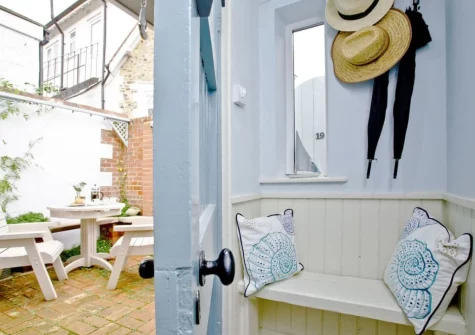 Step out into the courtyard & alfresco dining area at The Sail Loft, Beer
