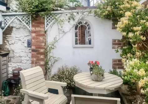 The courtyard & alfresco dining area at The Sail Loft, Beer
