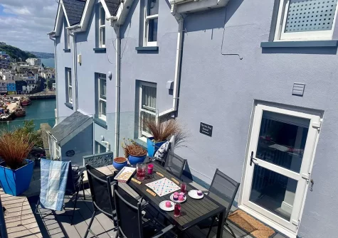 The balcony & alfresco dining area at The Sea Dog Retreat, Brixham