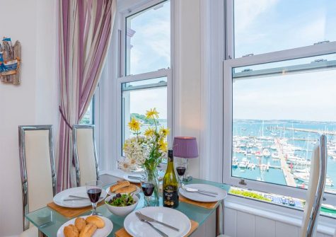The open-plan dining area at The Seahorse, 1 Harbour Lights, Brixham