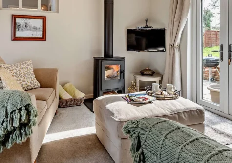 The Shippon, Hembury Gate Farm, Sheepwash is a delightful barn conversion nestled on 16 acres. Enjoy a wood-fired hot tub, games barn, and spacious paddock, the perfect countryside retreat for families seeking charm with modern comfort.