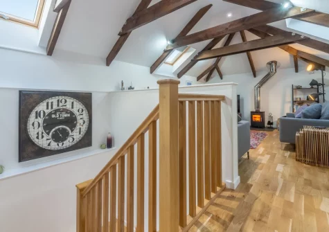 The living area & stairs down to the ground floor at The Shires at Presingoll Barns, St Agnes